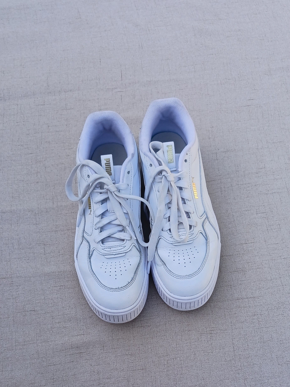 Puma White Lace-Up Sneakers with Gold Logo Accent